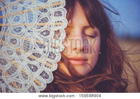 Girl With A Fan By The Sea