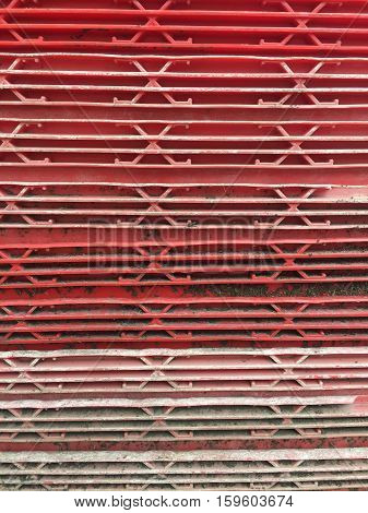 Dirty red plastic container abstract background texture
