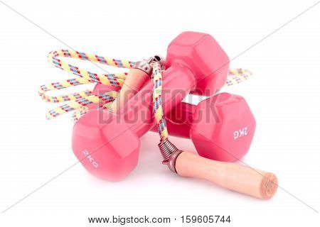 Two plastic coated dumbells and skipping rope isolated on white background.