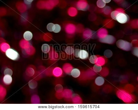 beautiful background of red sequins on a black background