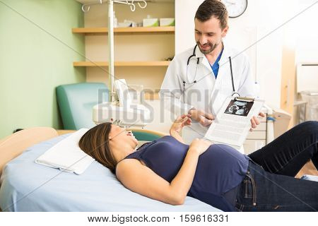 Doctor Showing Ultrasound To Patient