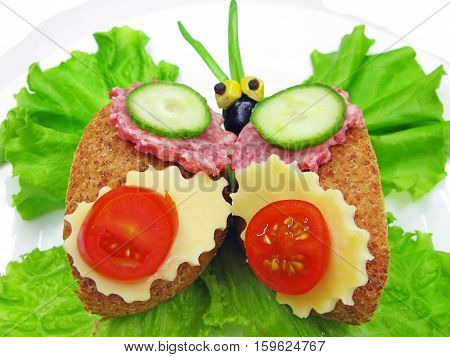 creative sandwich with cheese and salame butterfly shape