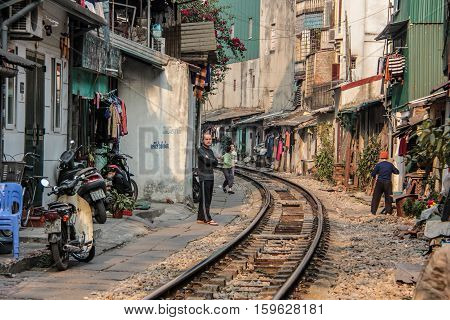 Editorial Image of rails trough the city of Hanoi - January 2014