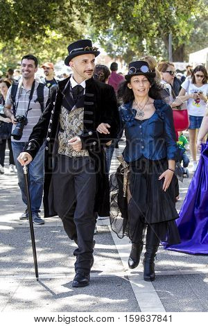 CAGLIARI, ITALY - May 29, 2016: Sunday at La Grande Jatte VIII Ed. At the Public Gardens - Sardinia - group of people parading in traditional Sardinian costume