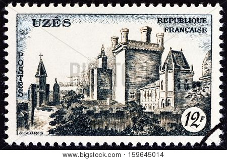 FRANCE - CIRCA 1957: A stamp printed in France shows Uzes Chateau, circa 1957.