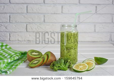 Smoothies of kiwi, Lemon and broccoli on a white background