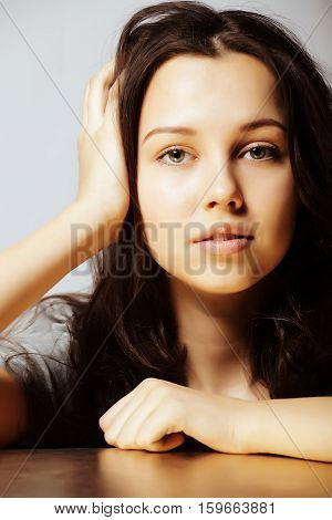 young pretty taned girl close up portrait smiling confident brunette warm, lifestyle people concept close up