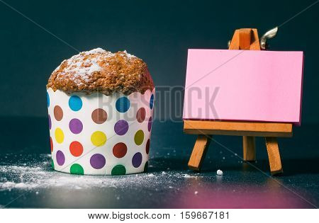 homemade muffins in colorful holders on the day of the birthday celebration. Kapka for children and women. blank sheet for writing your text