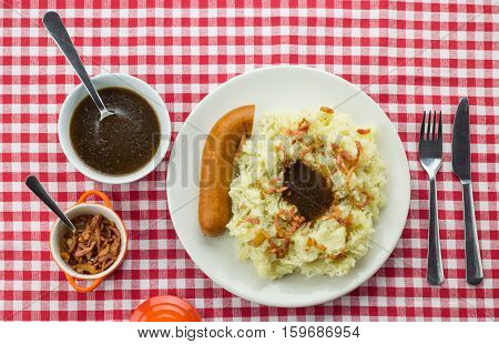 Typical Dutch Dish Zuurkool With Sauerkraut, Smoked Sausage And Gravy