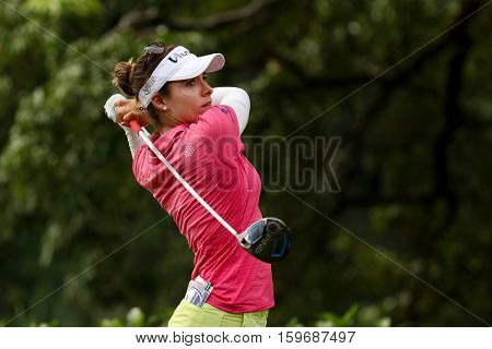 KUALA LUMPUR, MALAYSIA - OCTOBER 29, 2016: Gaby Lopez of Mexico tees off from the T-box of the 4th hole at the TPC Golf Course at the 2016 Sime Darby LPGA Malaysia golf tournament.