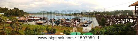 KANCHANABURI THAILAND - NOVEMBER 25: famous landmark of Sangkla Buri in the evening on November 25 2016 in Kanchanaburi Thailand
