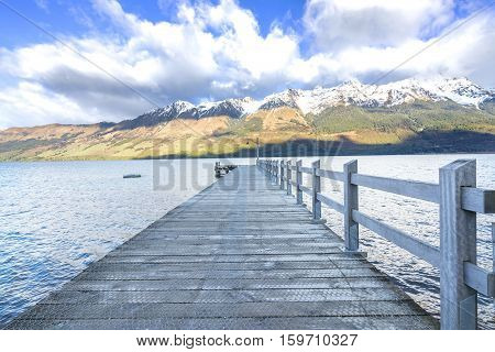 Wooden jetty at Glenorchy lake New Zealand.