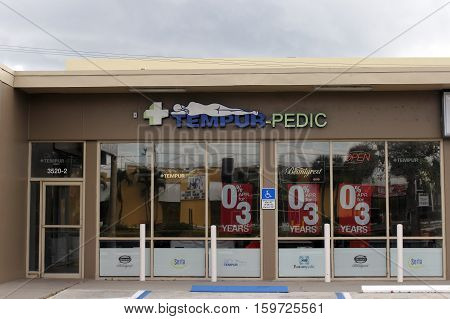 Fort Lauderdale FL USA - April 24 2016: Tempur-Pedic storefront and signage in a days morning. Directly outside the front of a sleeping mattress retail shop location.