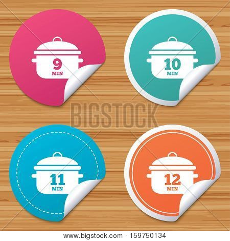 Round stickers or website banners. Cooking pan icons. Boil 9, 10, 11 and 12 minutes signs. Stew food symbol. Circle badges with bended corner. Vector