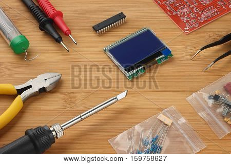 DIY Kit electronic components and tools for electronics assembly.