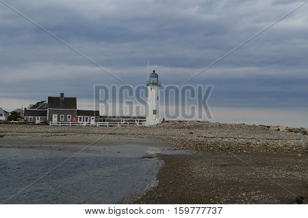 Gray clouds hanging over Old Scituate Light.