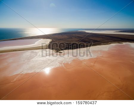 Aerial shot of Koyashskoe pink salt lake firth in Crimea