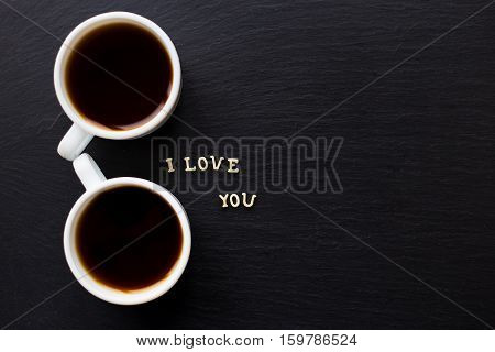 The inscription I love you, two cups of coffee. Surprise for a loved one.