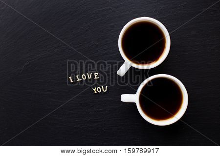The inscription I love you, two cups of coffee. Surprise for a loved one.