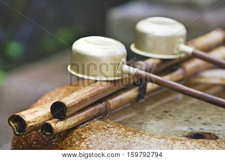 Japan, Nara, Kofuku-ji Temple, Row of ladles, close-up