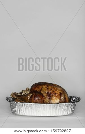 Roasted turkey in tinfoil pan