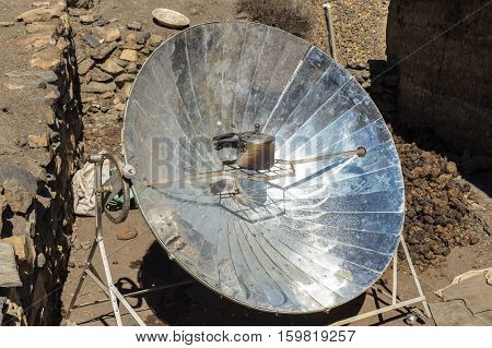 Eco-friendly solar heater for boiling water in the himalayan mountains in Nepal.