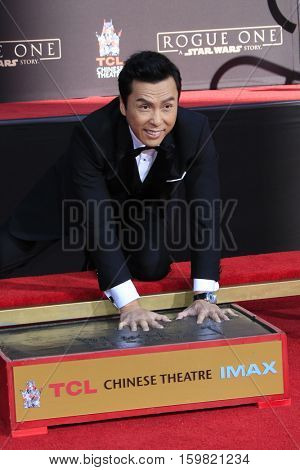 LOS ANGELES - DEC 1:  Donnie Yen at the Donnie Yen Hand And Footprint Ceremony at TCL Chinese Theater IMAX on December 1, 2016 in Los Angeles, CA