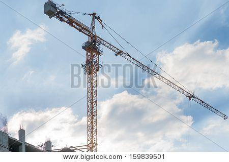 Tower Crain Construction Building In Blue Sky