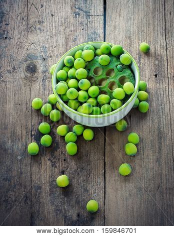 Lotus Seeds In White Bowl On Wood Background