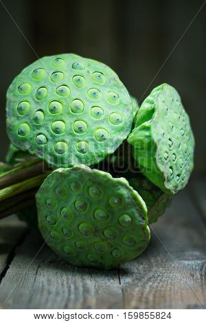 Calyx, Lotus Seeds Green On Wood Background