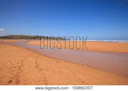 LIENCRES DUNES SPAIN - AUGUST 21: View of the Liencres dunes nature reserve in the Cantabrian sea on August 21 2016