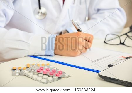 Doctor Writing A Perscription