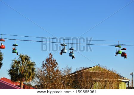 sky ride carnival fair blue sky palmetto tree