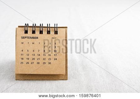 September. Calendar sheet. Two thousand and seventeen year calendar on bright background with copy space on right side.