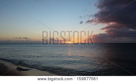 Sunset with clouds over the ocean. Turks and caicos islands.