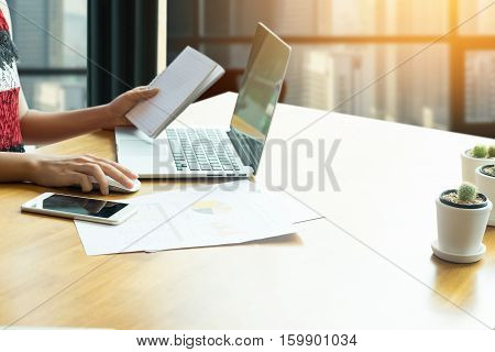 young business woman working on laptop computer