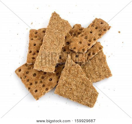 Rye or black bread crumbs isolated on a white background
