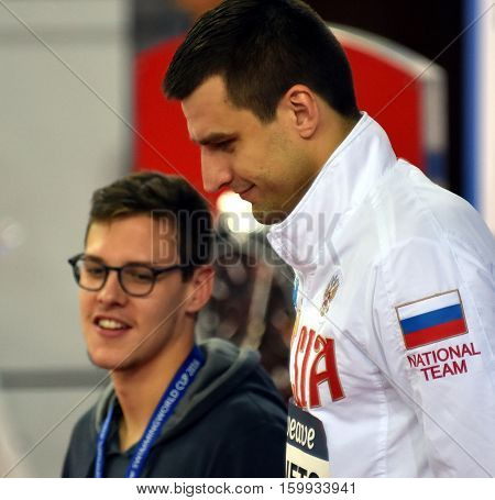 Hong Kong China - Oct 29 2016.Mitchell LARKIN (AUS) and the winner DONETC Stanislav (RUS) at the Victory Ceremony of Men's Backstroke 100m. FINA Swimming World Cup Victoria Park Swimming Pool.