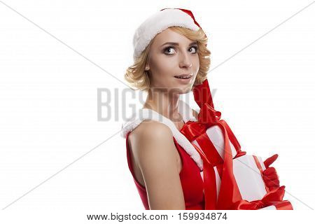 Picture of cheerful santa helper blond young girl with gift box