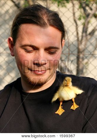 Young Man And Duck