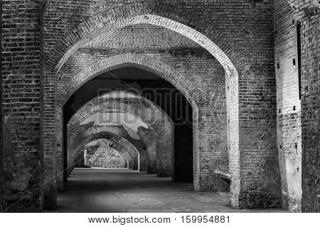 An ancient fortified tunnel in VigevanoItaly.Black and white photo.