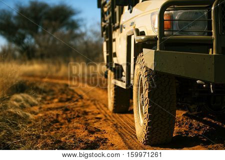 off road car on sand road in Africa