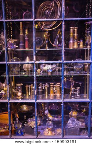 Leavesden, London, UK - 1 March 2016: Shops  windows display with magic objects in Diagon Alley from Harry Potter film. Warner Brothers Studio