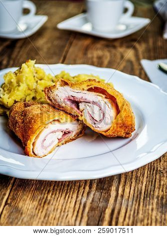 Traditional French Cuisine Chicken Roll Cordon Bleu Or Gordon Blue With Cheese, Ham And Mashed Potat