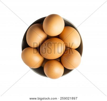 Eggs Isolated On White Background. Eggs Isolated In Wooden Bowl . Close-up Of An Egg Isolated On Whi