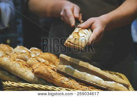 Men's Hands Cut Bread For Sandwiches, Sandwich Blanks