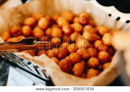 Detail Struffoli, An Italian Traditional Dessert From Naples, Made With Fried Sweet Pastries And Hon