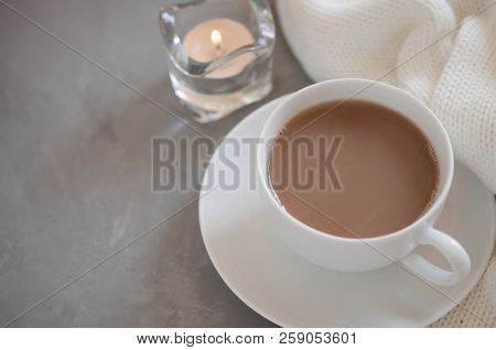 Still Life Details In Home Interior Of Living Room. Cup Of Cocoa On A Table, Candles And Knited Blan