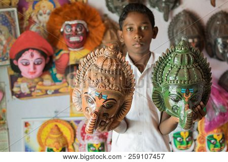 Purulia, West Bengal, India - August 15, 2017 : Boy With Colorful Chhau (or Chhou) Mask Of Hindu God