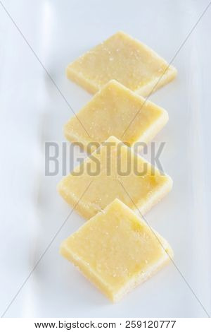 Burfi Or Barfi Famous Indian Sweets. Popular Festival Food From India. Selective Focus. White Backgr